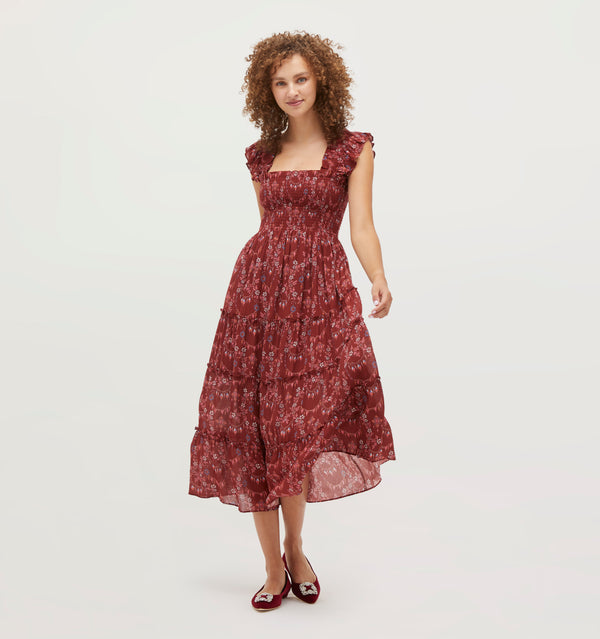 Gabriella wears a size XS in the Garnet Charm Scallop Crinkle Chiffon color: Garnet Charm Scallop Crinkle Chiffon