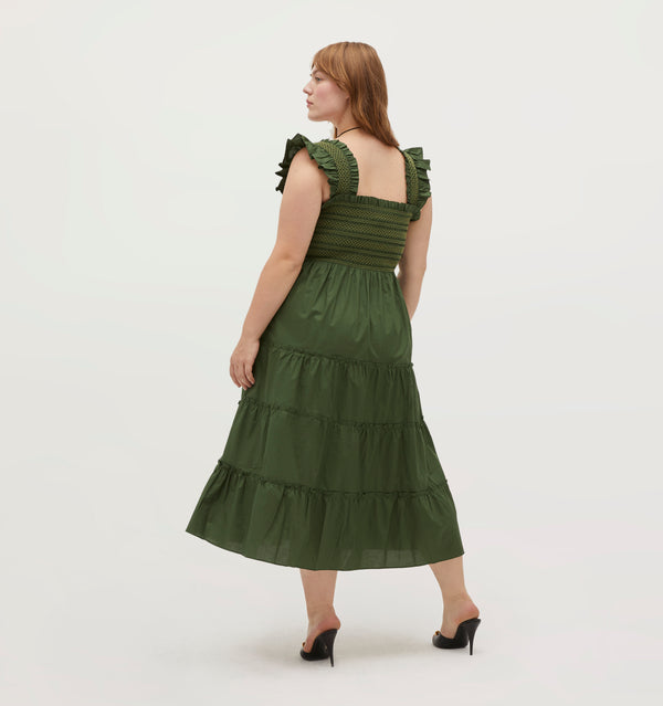 Lulu wears a size L in the Leaf Green color: Leaf Green Cotton