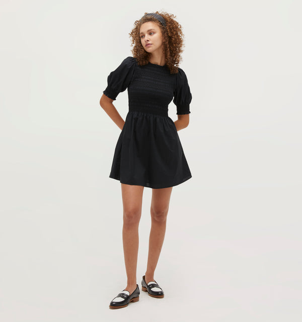 Gabriella wears and XS in the Black Cotton color:black cotton