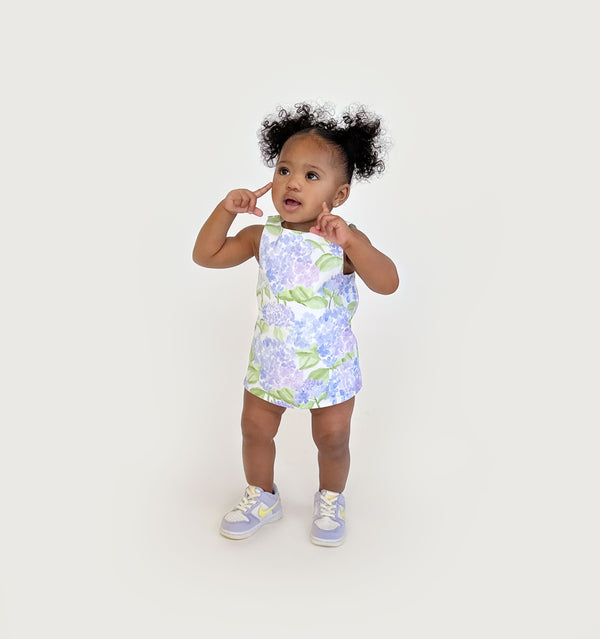 Ka’lani wears a size 12-18M in the Blue Hydrangea Cotton color: Blue Hydrangea Cotton