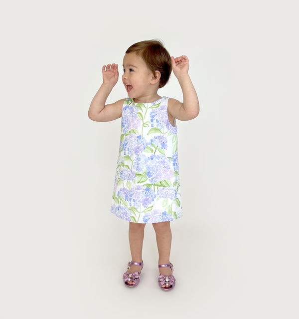 Sienna wears a size 2Y in the Blue Hydrangea Cotton color: Blue Hydrangea Cotton