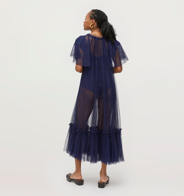 Na'jeen wears a S in the Navy Tulle color:navy tulle