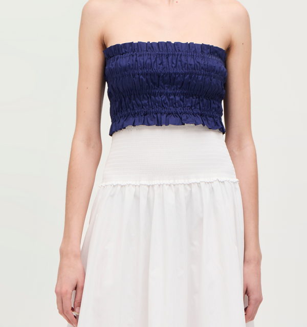 Lillian wears a size XS in the Navy Cotton color: navy cotton
