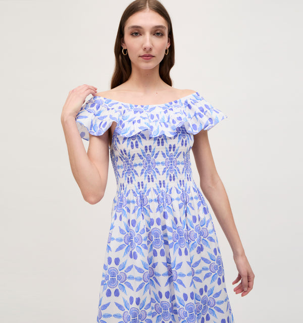 Lillian wears a size XS in the Blue Shell Mosaic Cotton color: Blue Shell Mosaic Cotton