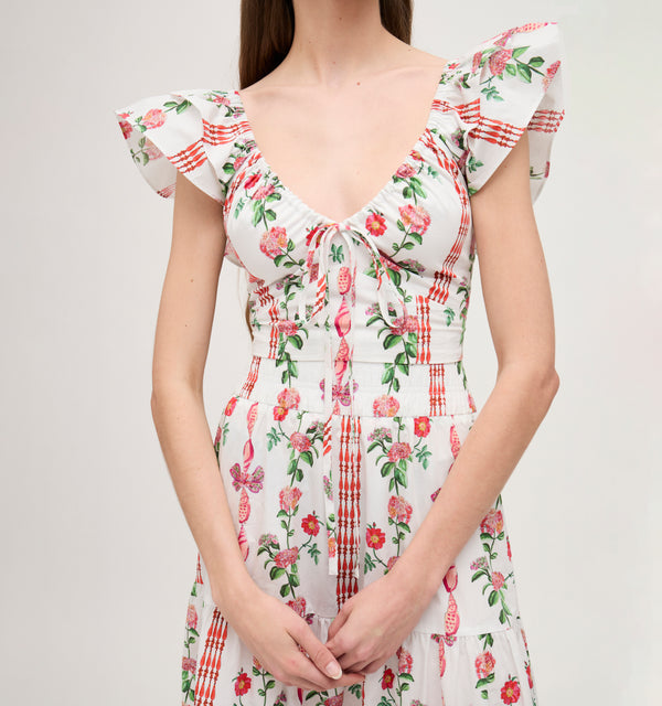 Lillian wears a size XS in the Red Shell Vine Stripe Cotton color: Red Shell Vine Stripe Cotton