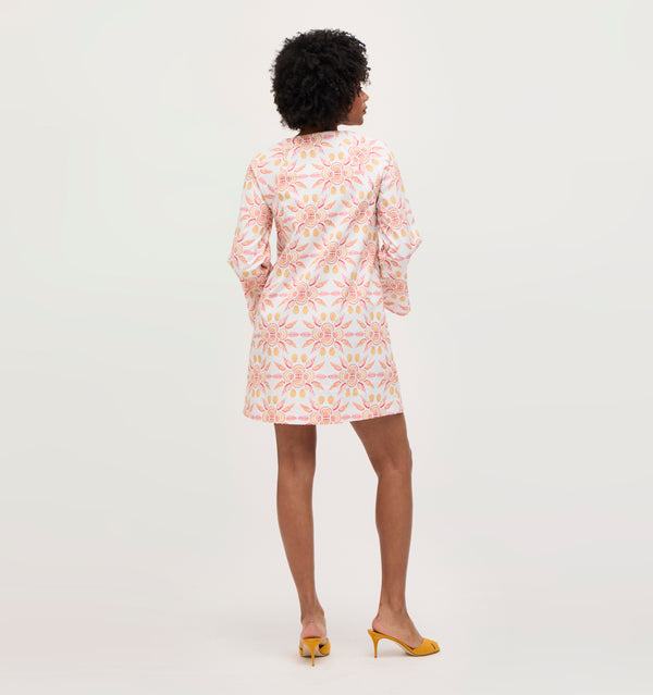 Na’Jeen wears a size S in the Orange Shell Mosaic Cotton color: Orange Shell Mosaic Cotton