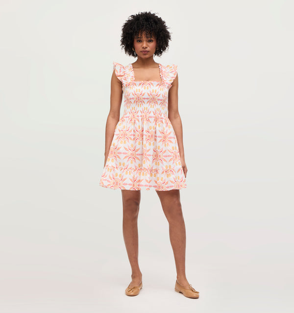 Na’Jeen wears a size S in the Orange Shell Mosaic Cotton color: Orange Shell Mosaic Cotton