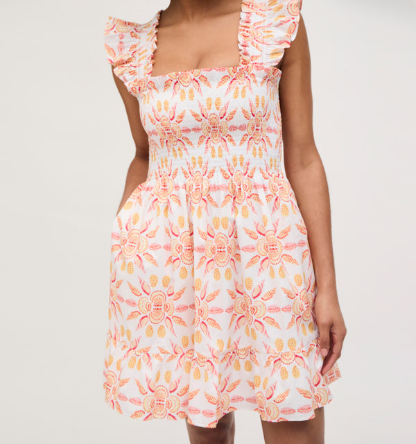 Na’Jeen wears a size S in the Orange Shell Mosaic Cotton color: Orange Shell Mosaic Cotton