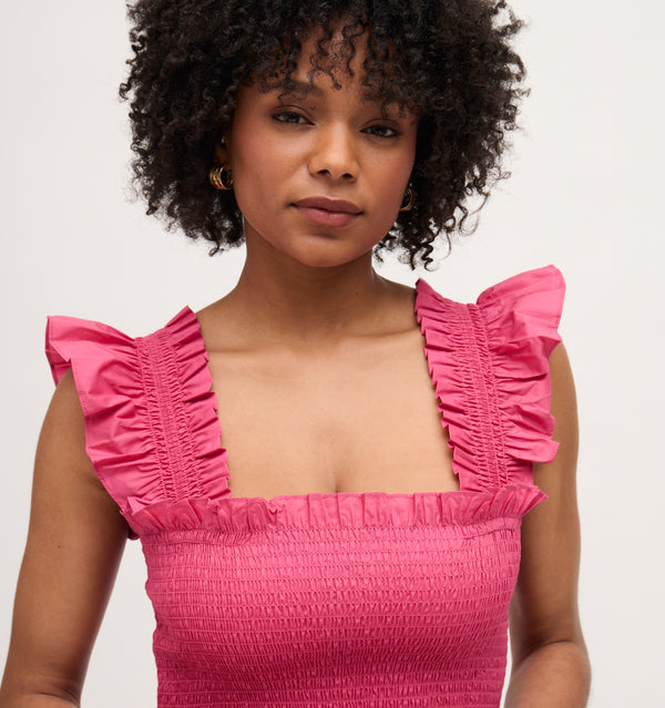 Na’Jeen wears a size S in the Lipstick Pink Cotton color: lipstick pink cotton
