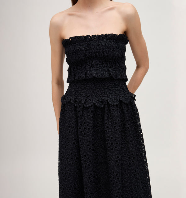 Lillian wears a size XS in the Black Scallop Lace color: Black Scallop Lace