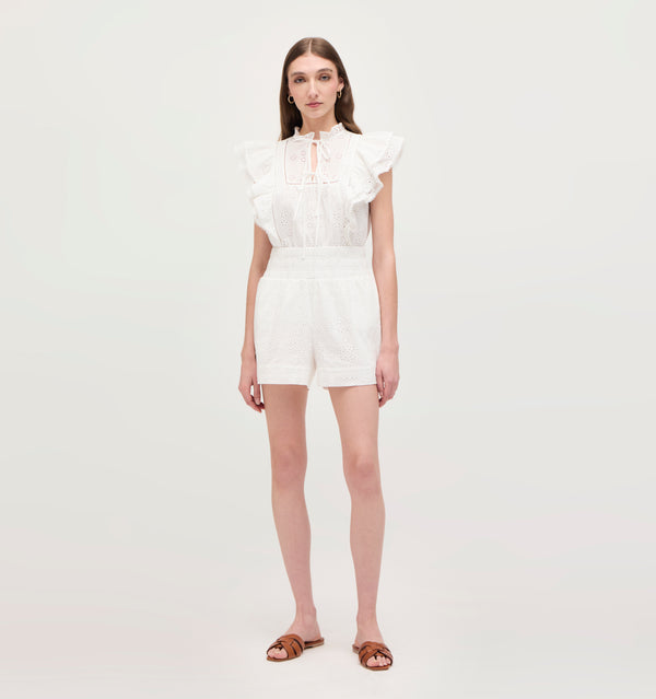 Lillian wears a size XS in the White Eyelet color: White Eyelet
