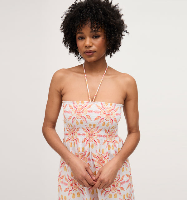 Na’Jeen wears a size S in the Orange Shell Mosaic Cotton color: Orange Shell Mosaic Cotton