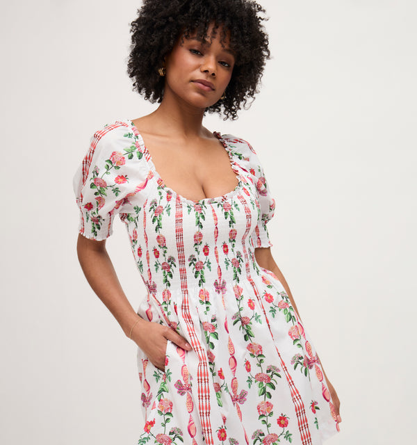 Na’Jeen wears a size S in the Red Shell Vine Stripe Cotton color: Red Shell Vine Stripe Cotton