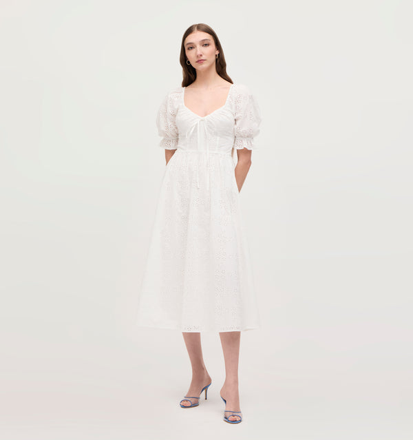 Lillian wears a size XS in the White Eyelet color: White Eyelet