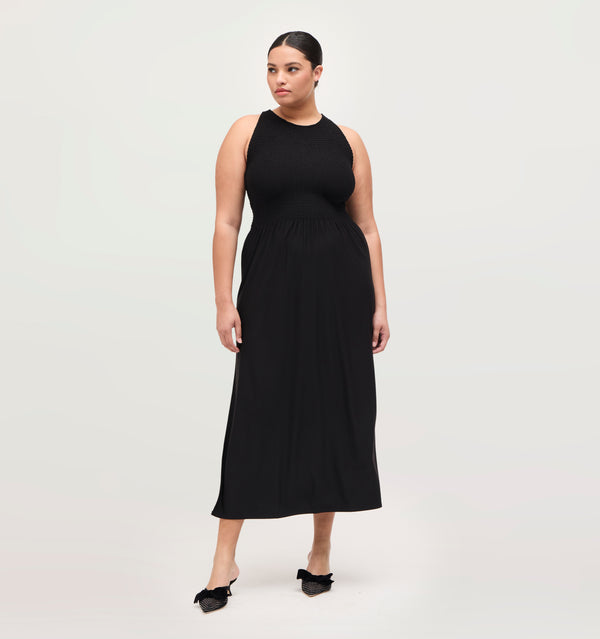 Hayley wears a size XL in the Black color: Black