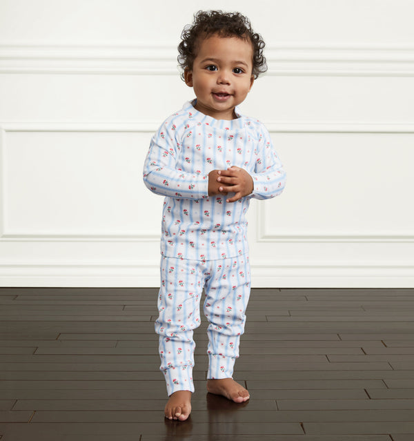 Ace wears a 12-18M in the floral stripe color:floral stripe 
