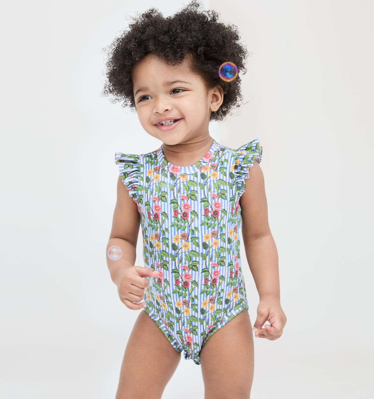 The Jillee Ruffle Onesie - Geranium Stripe