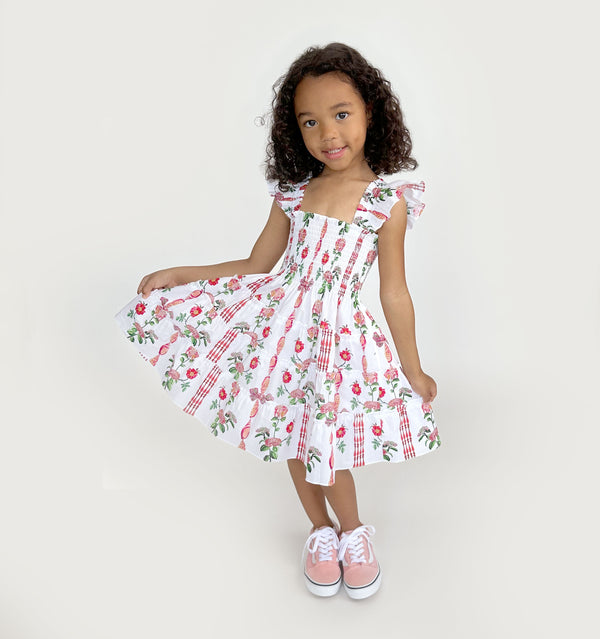 Navy wears a 5-6Y in the Red Shell Vine Stripe Cotton color: Red Shell Vine Stripe Cotton