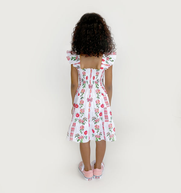 Navy wears a 5-6Y in the Red Shell Vine Stripe Cotton color: Red Shell Vine Stripe Cotton