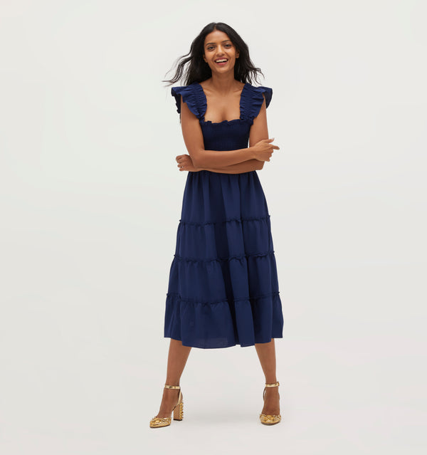 Palak wears a size XS in Navy Crepe color: Wrinkle Resistant Navy Crepe