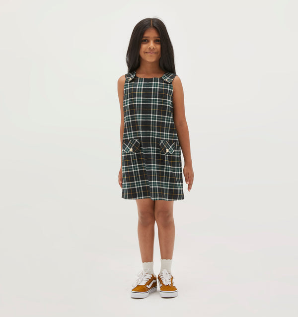 Amelia wears a 5/6Y in the Green Wallace Plaid color: green wallace plaid