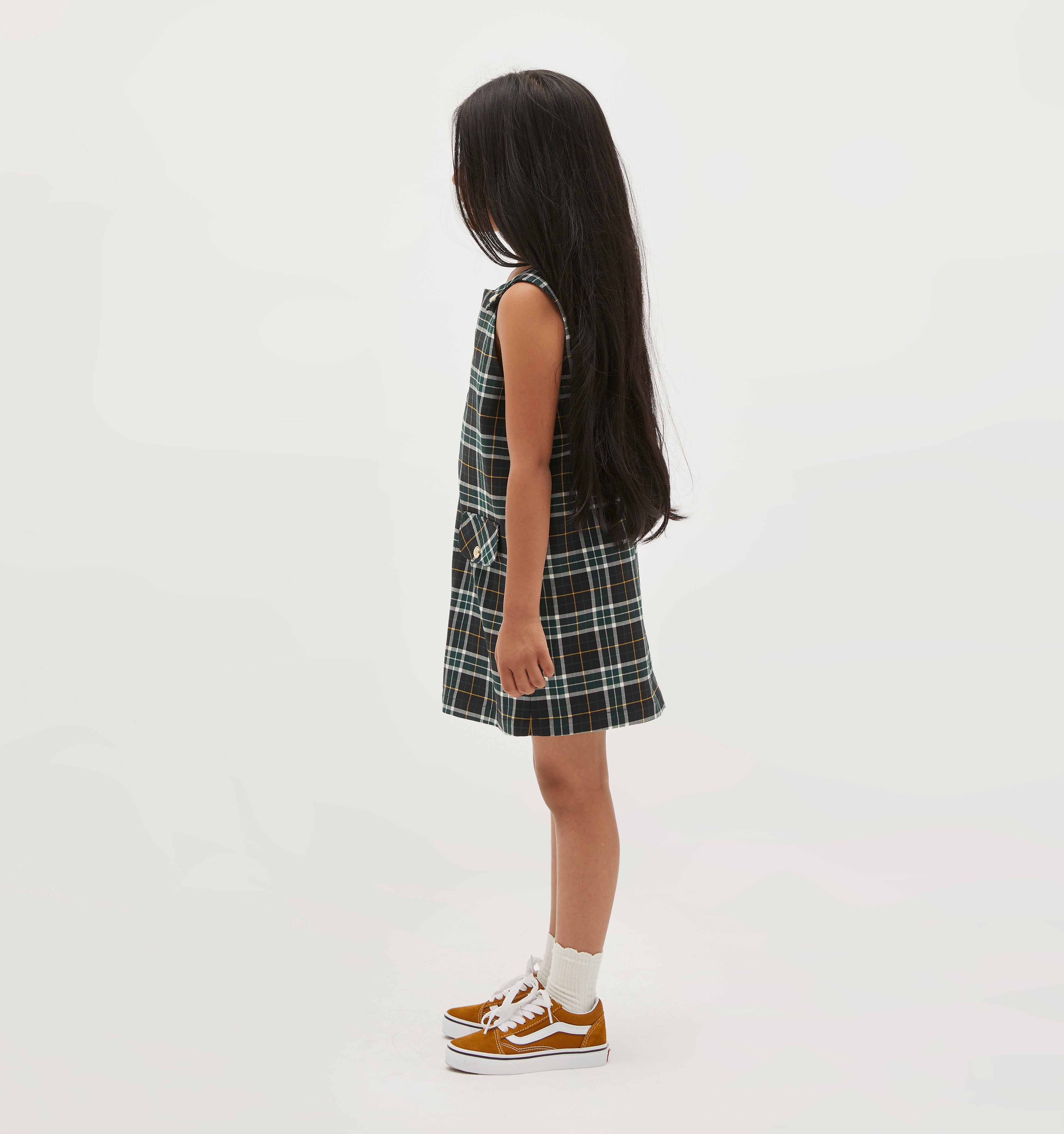 Amelia wears a 5/6Y in the Green Wallace Plaid color: green wallace plaid