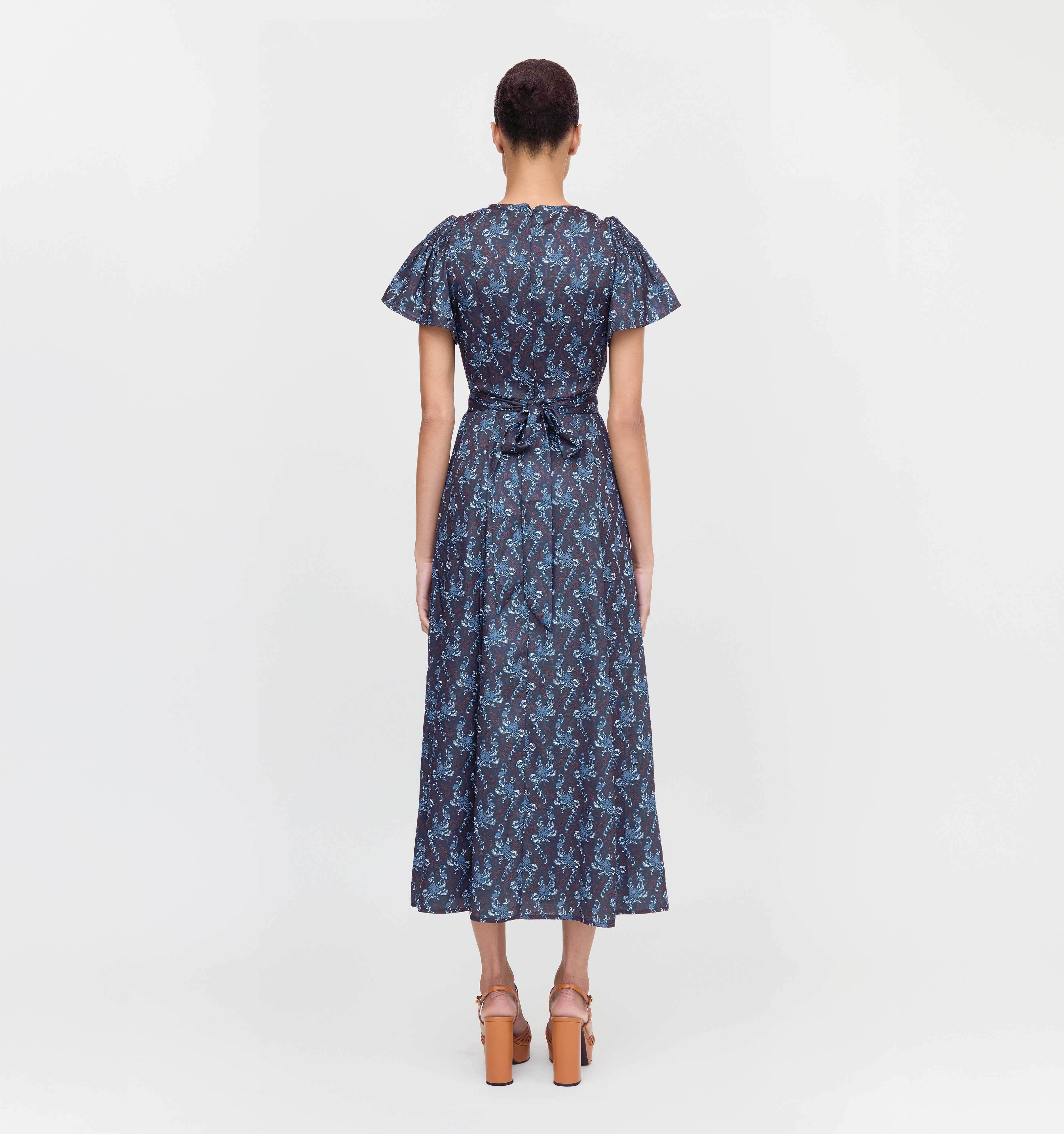 The Dominique Dress in Navy Cala Paisley color: Navy Cala Paisley