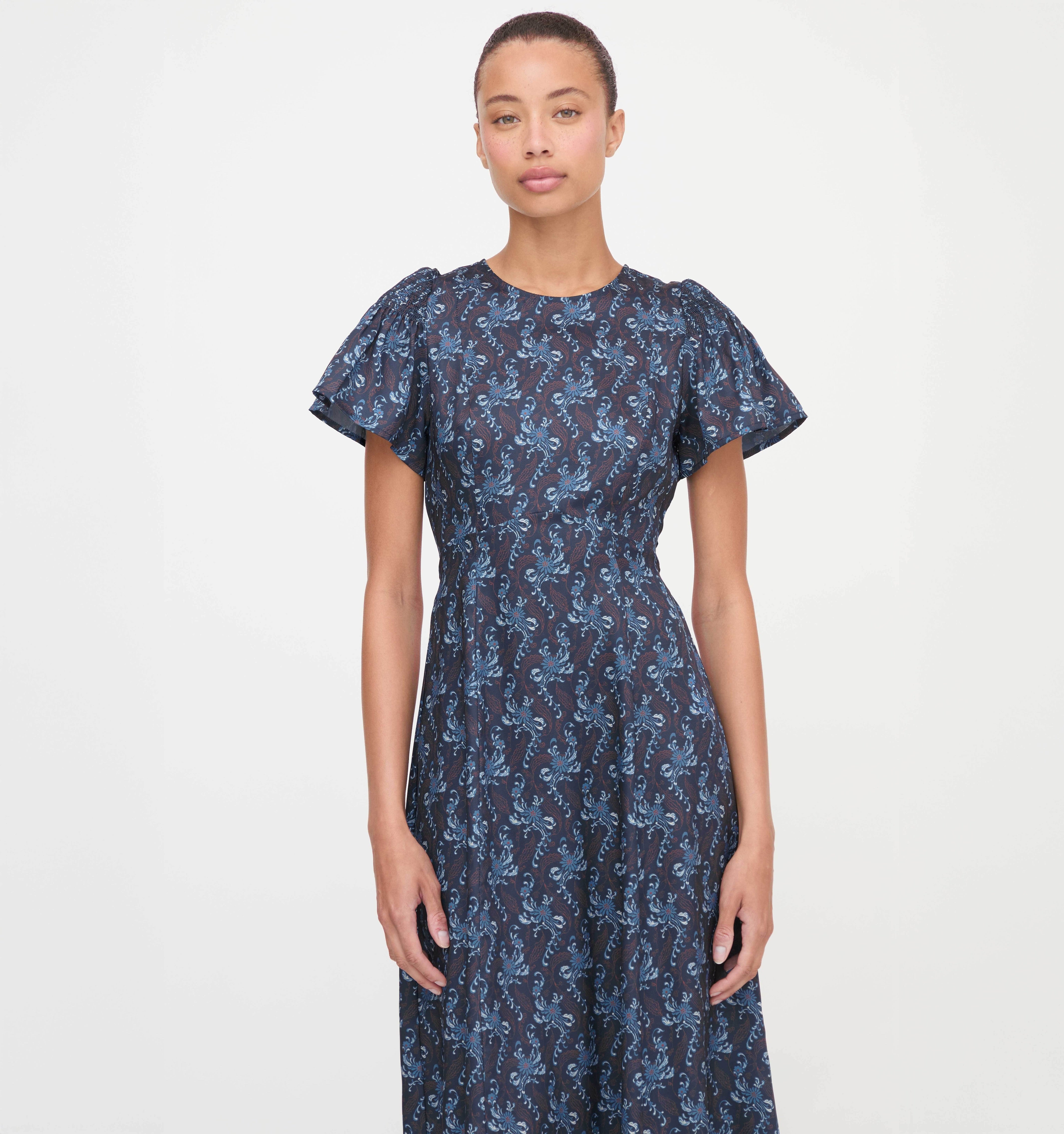 The Dominique Dress in Navy Cala Paisley color: Navy Cala Paisley