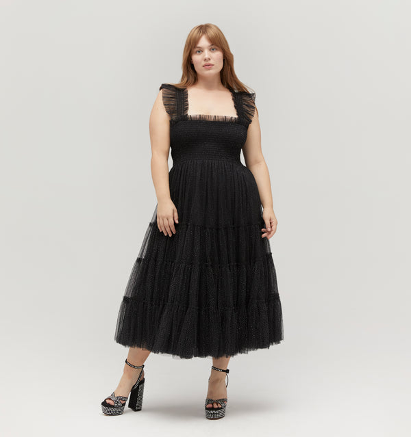 Lulu is 5’ 8” and wears a size XL in the Black Glitter Tulle color: Black Glitter Tulle