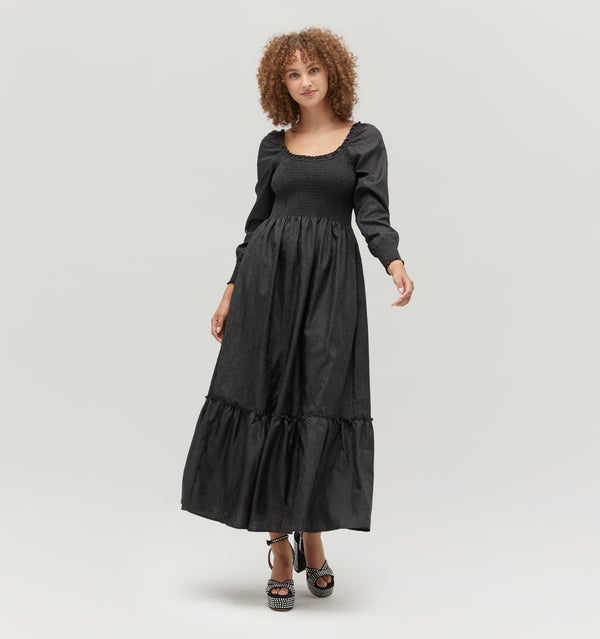 Gabriella is 5' 9.5" and wears a size XS in the Black Crushed Taffeta color: Black Crushed Taffeta