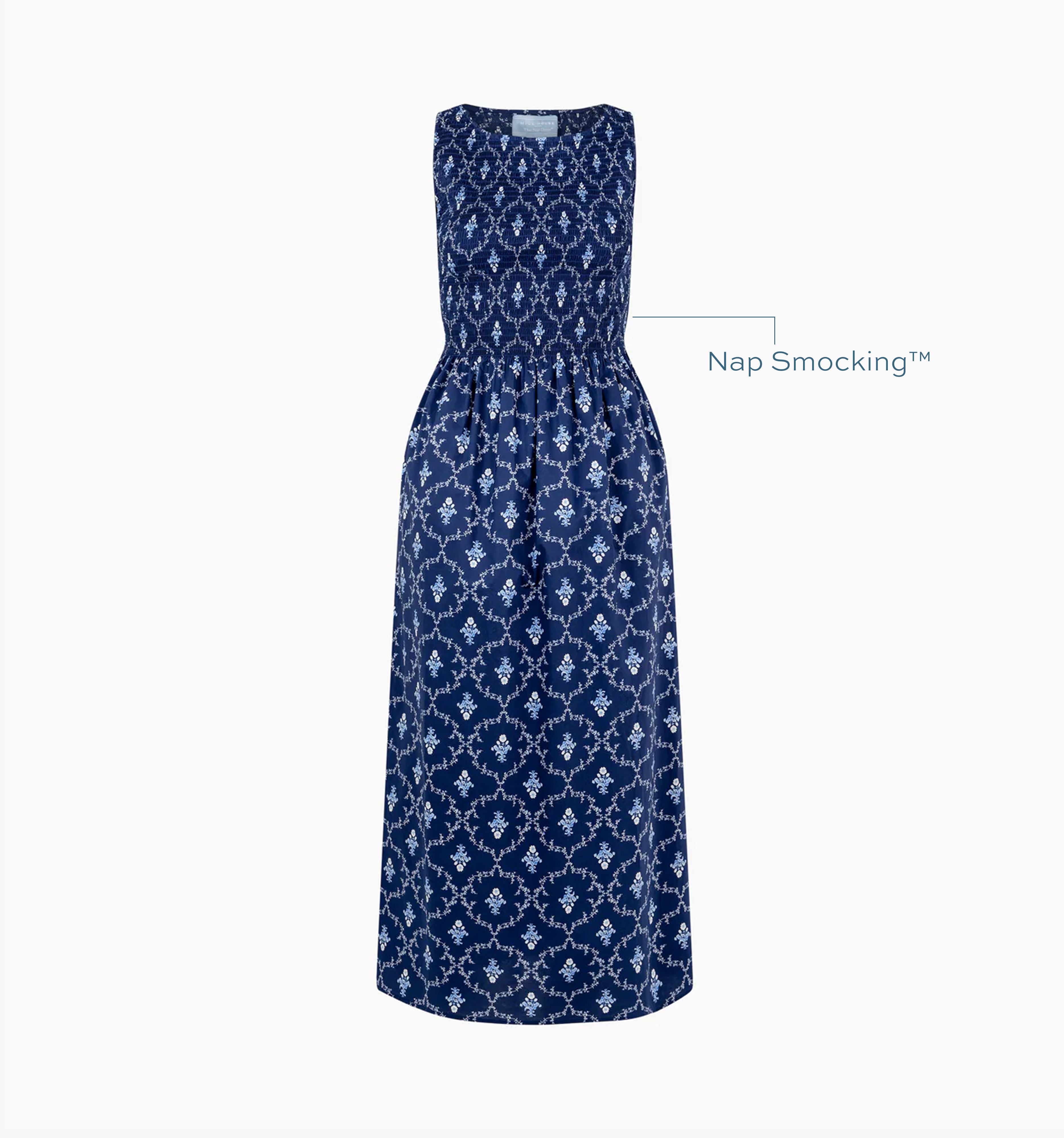 Image of a Nap Dress with text highlighting it's Nap Smocking™ color: Navy Trellis