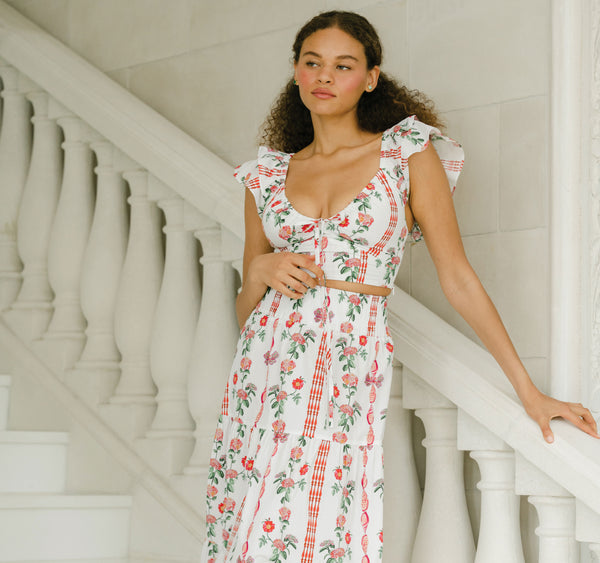 Destiny wears a size XS in the Red Shell Vine Stripe Cotton color: Red Shell Vine Stripe Cotton