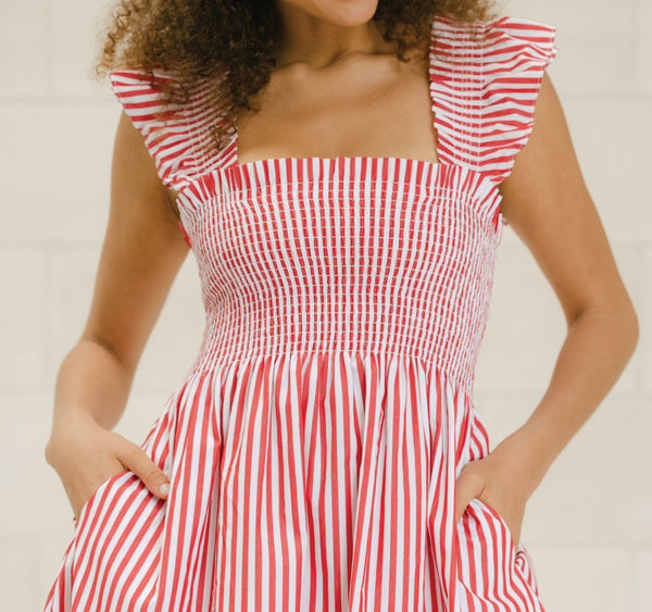 Destiny wears a size XS In the Cherry Stripe color: Cherry Stripe