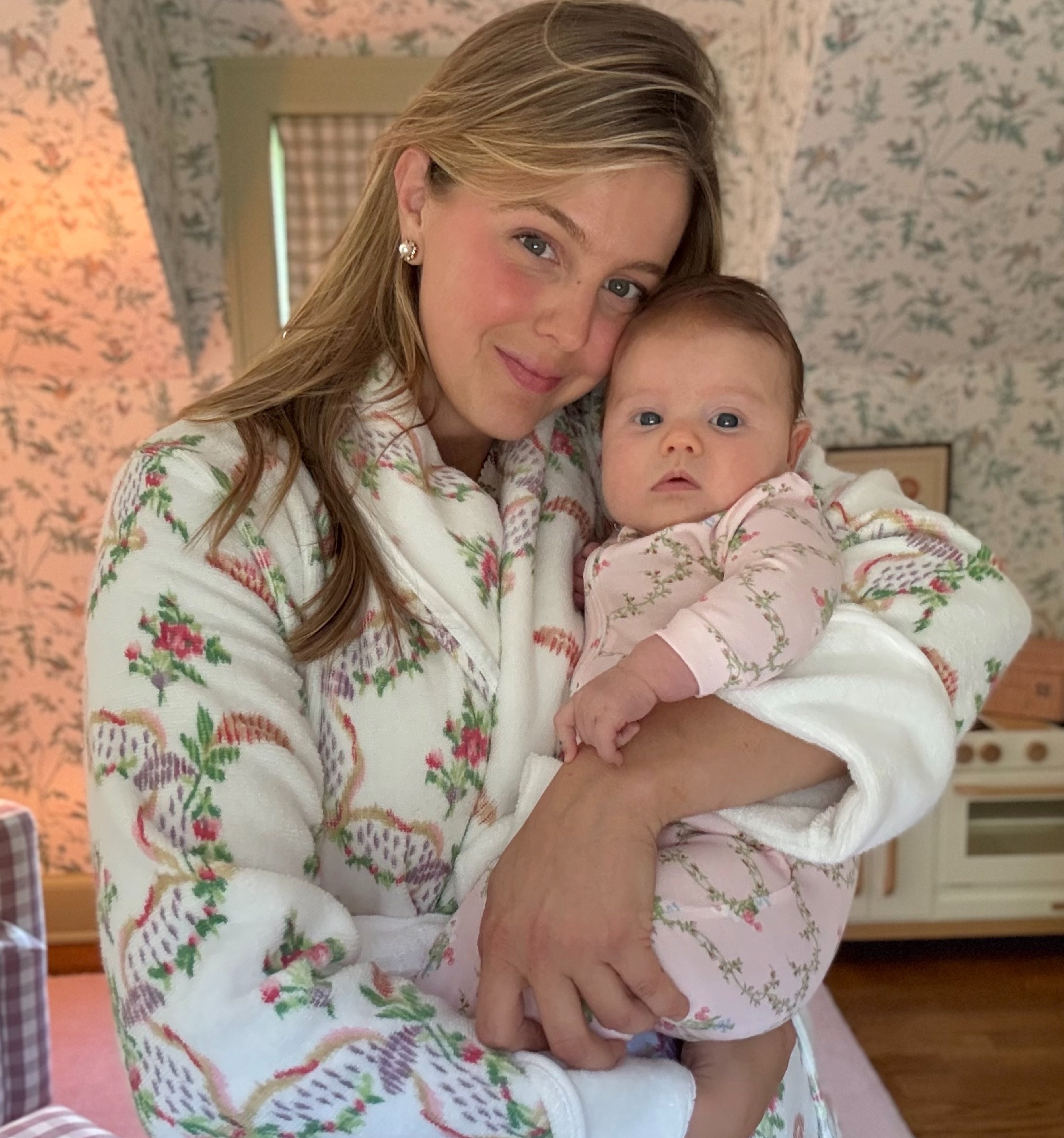 @samanthavarvel wears The Hotel Robe in Pink Ribbon Rose Ikat color: Pink Ribbon Rose Ikat