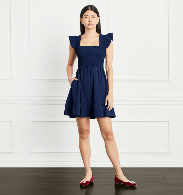 Sophia wears a size XS in the Navy Crepe color:navy crepe