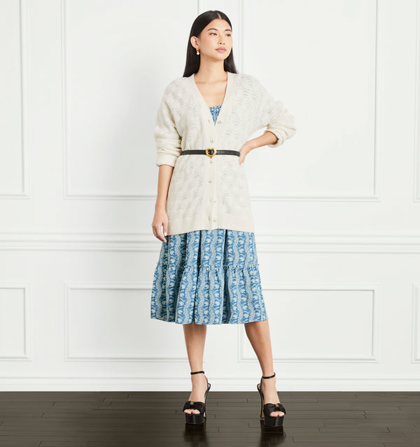 Sophia wears a size XS in the Cream Merino Wool color:cream merino wool