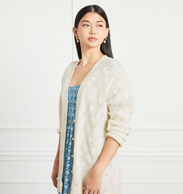 Sophia wears a size XS in the Cream Merino Wool color:cream merino wool
