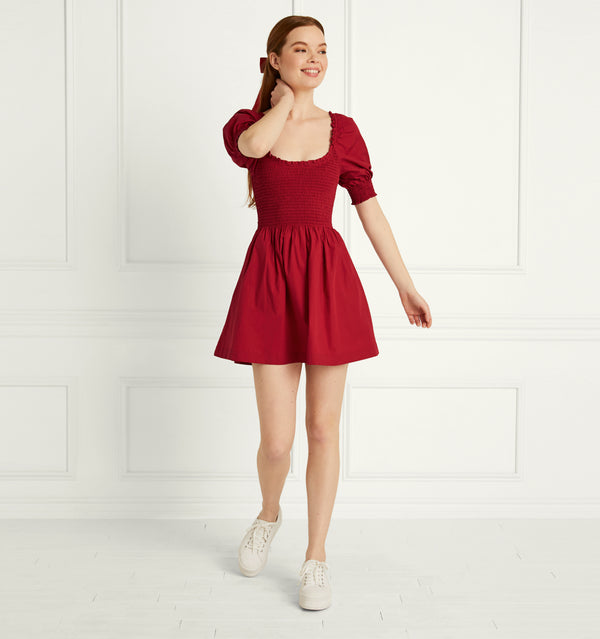 Anastasia wears and XS in the Victorian Red Cotton color: Victorian Red Cotton