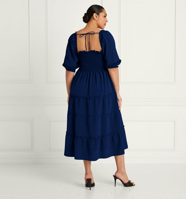 Stephanie wears an XL in the Navy Crepe color:navy crepe