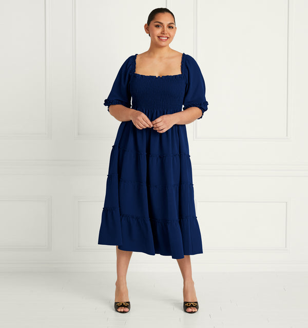 Stephanie wears an XL in the Navy Crepe color:navy crepe