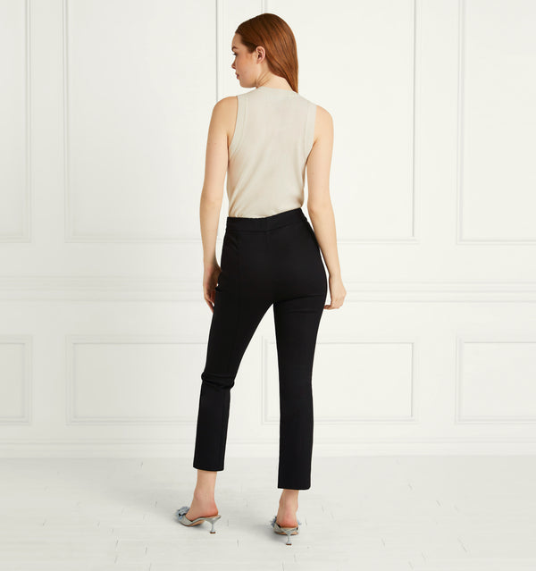 Anastasia wears and XS in the Black Stretch Cotton color:Black Stretch Cotton 