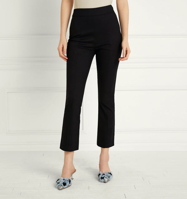Anastasia wears and XS in the Black Stretch Cotton color:Black Stretch Cotton 