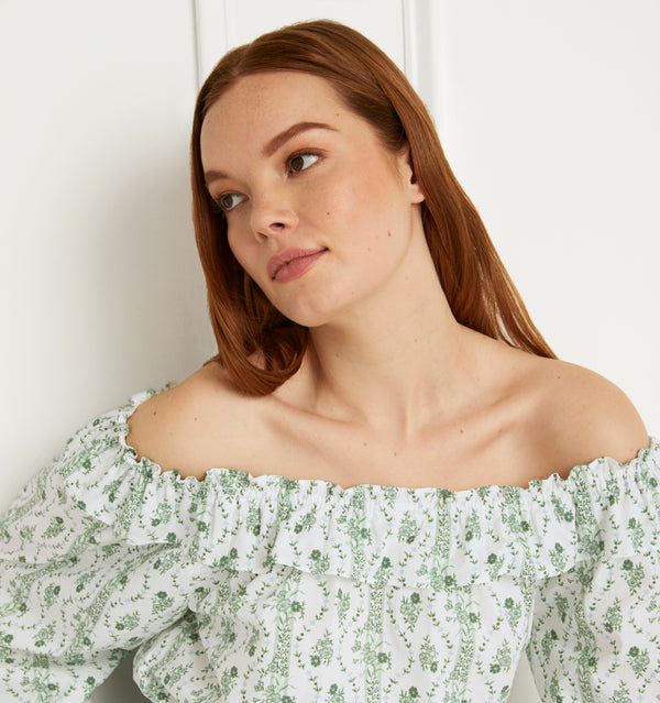 Anastasia wears and XS in the Green Vine Stripe Cotton color:green vine stripe cotton