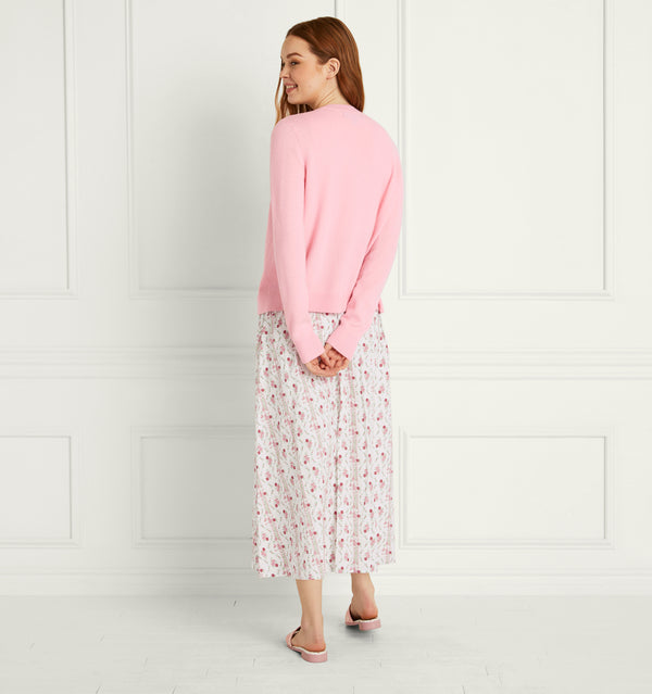Anastasia wears and XS in the Pink Merino Wool with Embroidery color:Pink Merino Wool with Embroidery