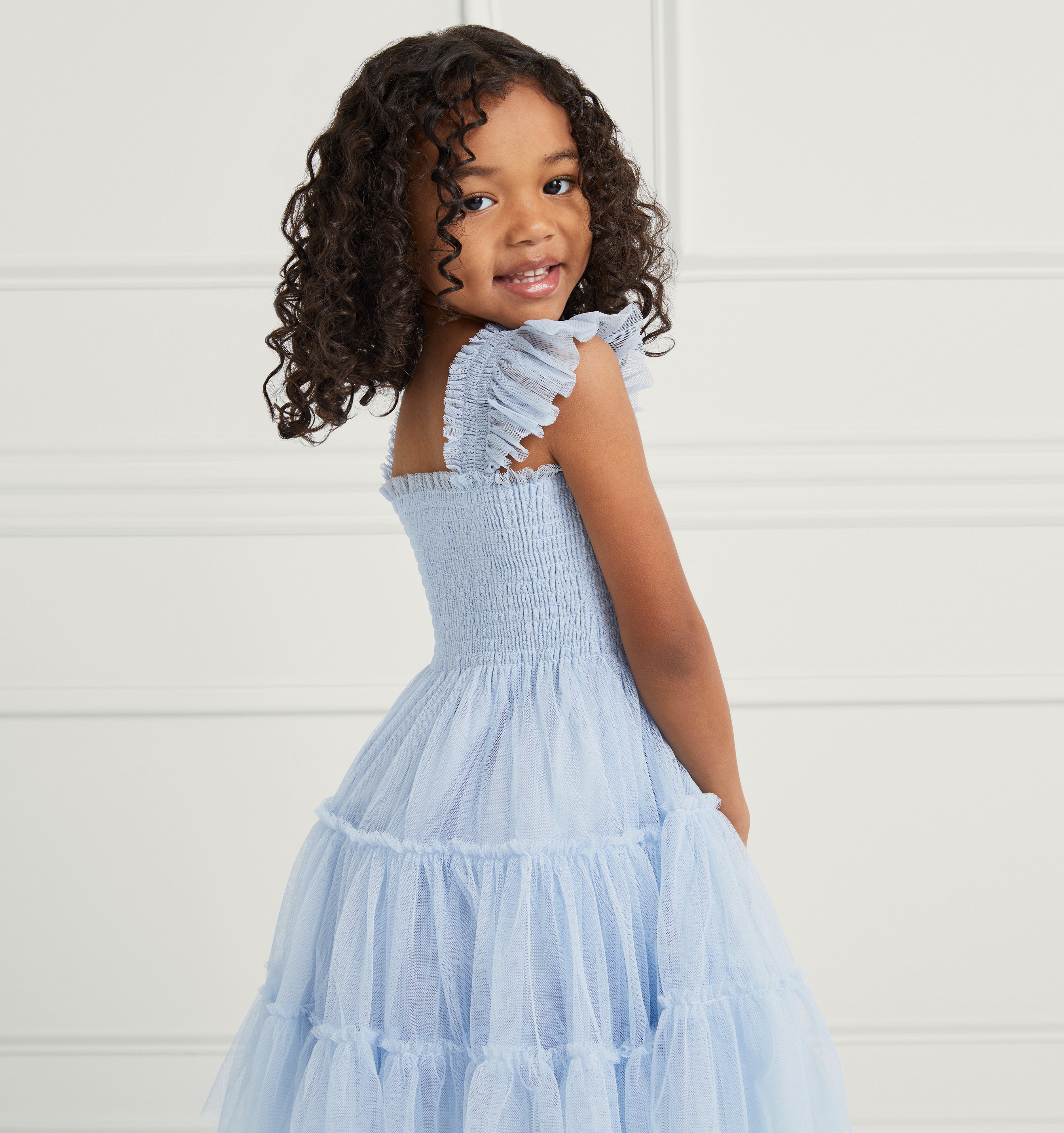 Navy wears a 5-6Y in the Powder Blue Tulle color:powder blue tulle