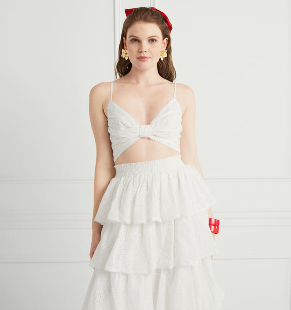 Savannah is 5’8” and wears a size XS in the White Eyelet color:White 