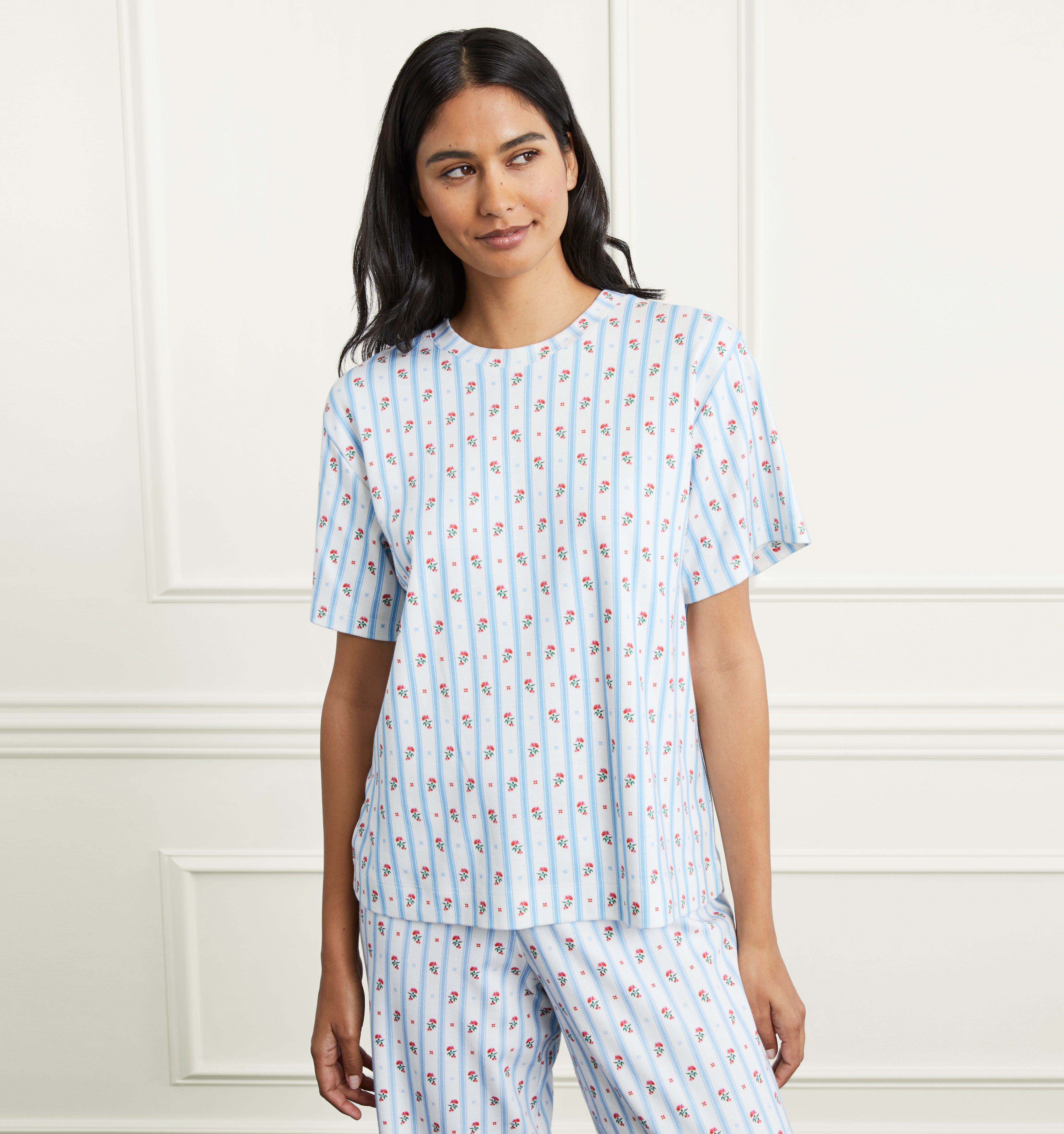 Ashika is 5’9.5” and wears an XS in the Floral Stripe color:floral stripe