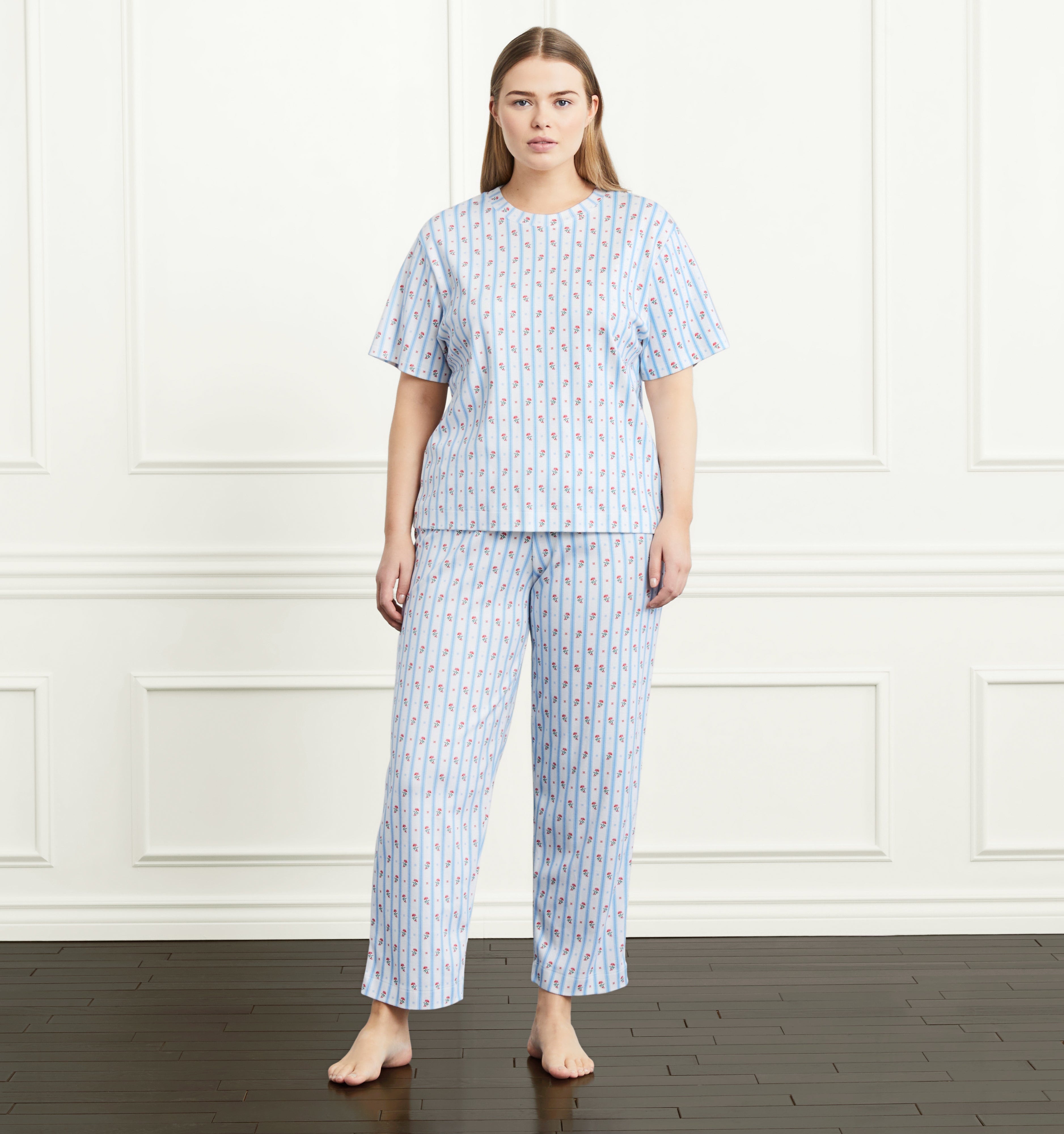 Ashild is 5’9.5” and wears an XL in the Floral Stripe color:floral stripe