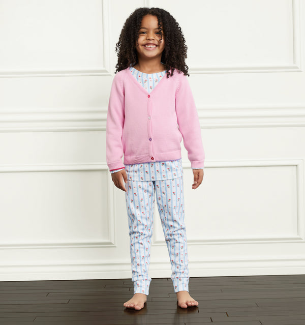 Syx wears a 5/6Y in the Pink color:pink